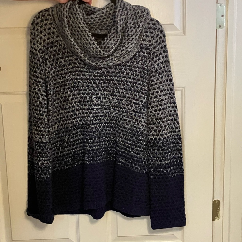 This is a beautiful and comfortable sweater. Very lightly worn.